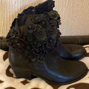 Black bootie with flower detail